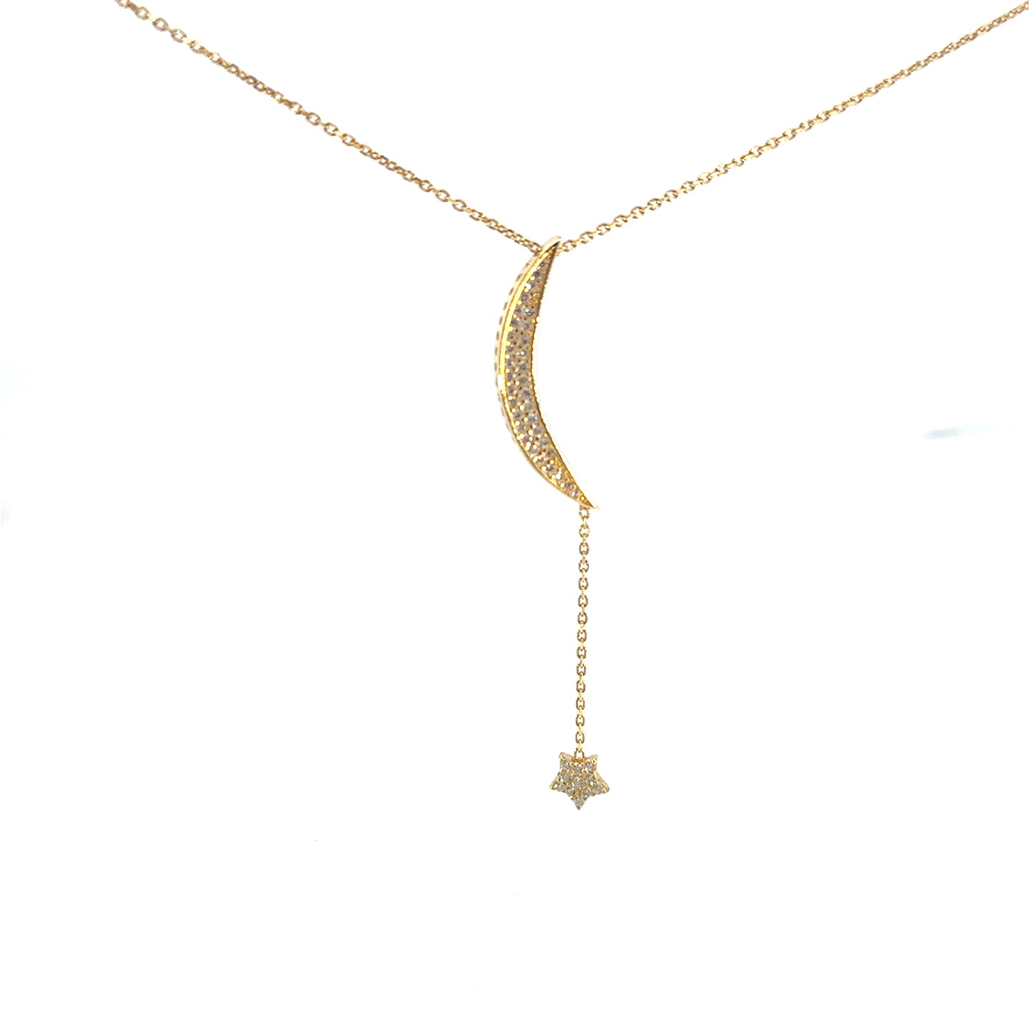 Gold necklace with a crescent moon and star pendant on a white background