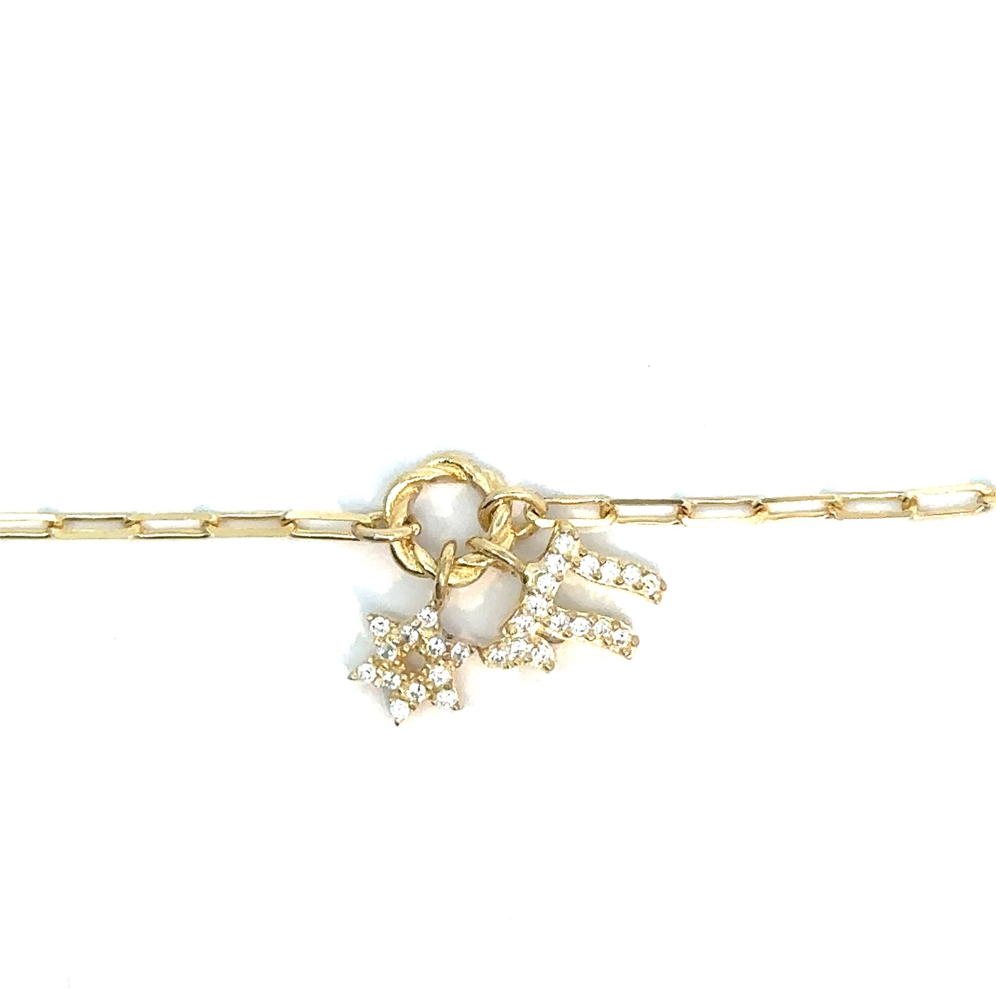 Gold bracelet with heart and star charms on a white background