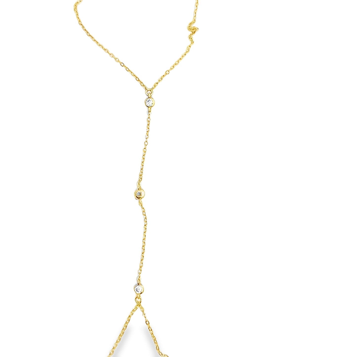 Gold necklace with small diamonds on a white background